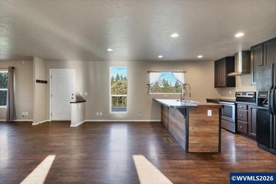 Enjoy open views of rolling hills from the 30 x 15 deck. This