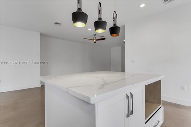Fully renovated 4-bedroom, 4-bath residence situated on an - photo 11