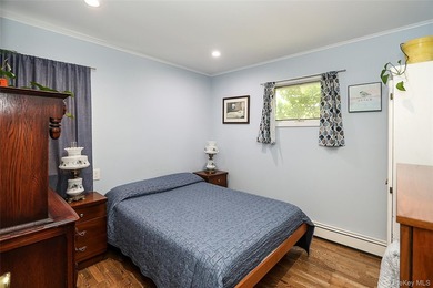 Welcome home to this spacious 6-bedroom, 2-bath Colonial nestled - photo 11