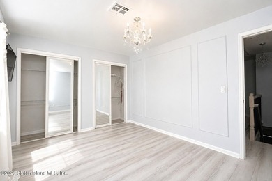 Only one 2-family home in Tottenville under 1 million! Located - photo 11
