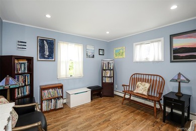 Welcome home to this spacious 6-bedroom, 2-bath Colonial nestled - photo 12