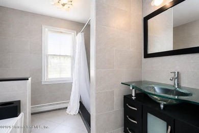 Only one 2-family home in Tottenville under 1 million! Located - photo 15