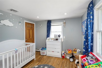 Welcome home to this spacious 6-bedroom, 2-bath Colonial nestled - photo 16
