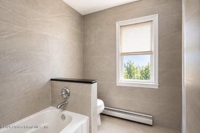 Only one 2-family home in Tottenville under 1 million! Located - photo 16