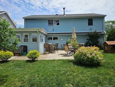 Welcome home to this spacious 6-bedroom, 2-bath Colonial nestled - photo 19