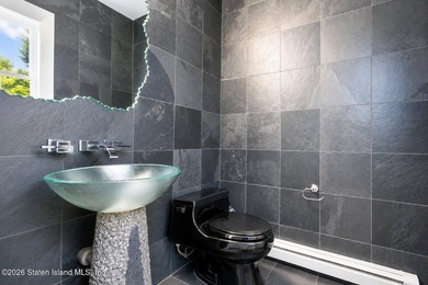 Only one 2-family home in Tottenville under 1 million! Located - photo 21