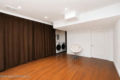 Only one 2-family home in Tottenville under 1 million! Located - photo 22