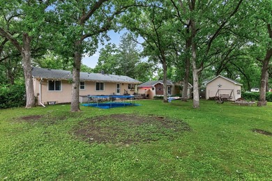 Welcome home to this beautifully updated 4-bedroom, 2-bath - photo 27