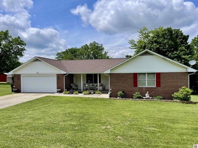 Welcome to beautiful 401 Centennial Drive: a spacious brick - photo 2