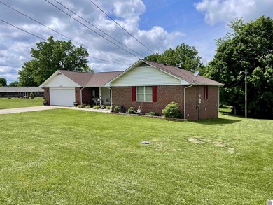 Welcome to beautiful 401 Centennial Drive: a spacious brick - photo 3