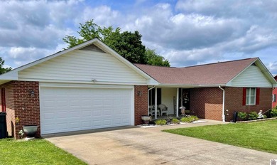 Welcome to beautiful 401 Centennial Drive: a spacious brick - photo 4