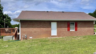 Welcome to beautiful 401 Centennial Drive: a spacious brick - photo 7