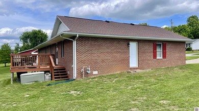 Welcome to beautiful 401 Centennial Drive: a spacious brick - photo 8