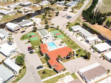 Pine Island Cove 55+ community.munity POOL, HOT TUB, CLUBHOUSE - photo 9