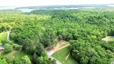 This 18-acre tract of rolling, wooded land just minutes from - photo 1