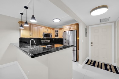 Welcome to effortless South Florida living! This completely - photo 4