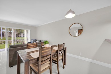 Welcome to effortless South Florida living! This completely - photo 8