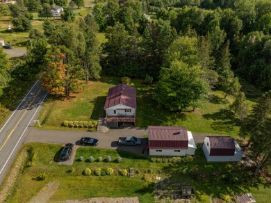 Lake Home For Sale in Sangerville, Maine