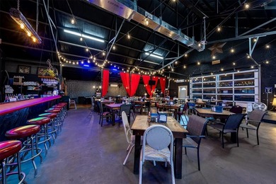 This restaurant and bar is located on 1.3 acres directly across - photo 6