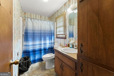 Discover the possibilities with this charming brick ranch - photo 17