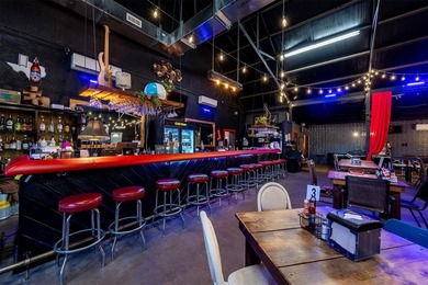 This restaurant and bar is located on 1.3 acres directly across - photo 7
