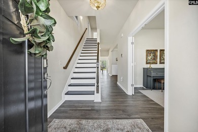 Welcome to 209 Chapin Place Way, a beautifully appointed - photo 3