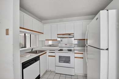 Create your own masterpiece in this spacious first floor lake - photo 11