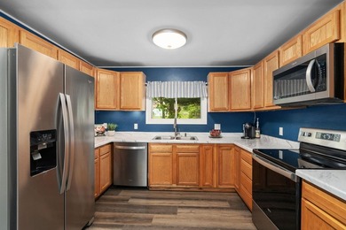 Tucked on a quiet street in Edgerton, this fully remodeled 2-bed - photo 14