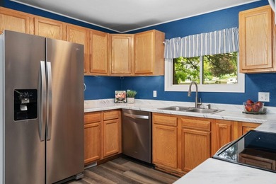 Tucked on a quiet street in Edgerton, this fully remodeled 2-bed - photo 15