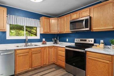 Tucked on a quiet street in Edgerton, this fully remodeled 2-bed - photo 16