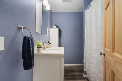 Tucked on a quiet street in Edgerton, this fully remodeled 2-bed - photo 17