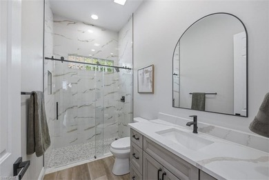 Situated on a private cul-de-sac along the 12th fairway of the - photo 21