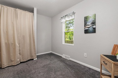 Tucked on a quiet street in Edgerton, this fully remodeled 2-bed - photo 21