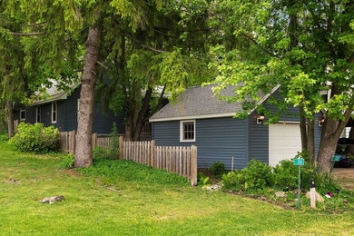 Tucked on a quiet street in Edgerton, this fully remodeled 2-bed - photo 27