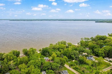 Tucked on a quiet street in Edgerton, this fully remodeled 2-bed - photo 34