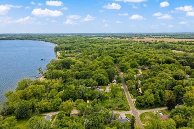 Tucked on a quiet street in Edgerton, this fully remodeled 2-bed - photo 35