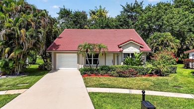 Welcome to this charming three-bedroom, two-bathroom - photo 1