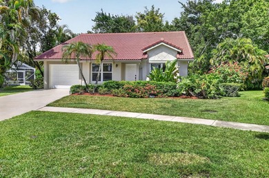 Welcome to this charming three-bedroom, two-bathroom - photo 4