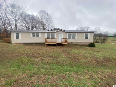 Check out this affordable home. Hardly lived in over the years - photo 1
