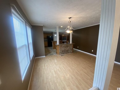 Check out this affordable home. Hardly lived in over the years - photo 7