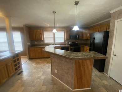 Check out this affordable home. Hardly lived in over the years - photo 9