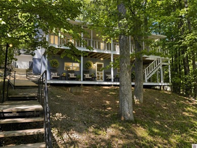 Welcome to your ultimate lakefront escape! This charming - photo 1