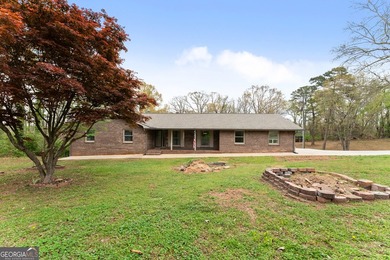 Well-kept and ready to go, this solid brick home offers comfort - photo 7