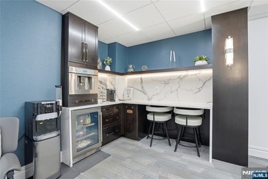 Welcome to Residence 14R at the Atrium, a beautifully maintained