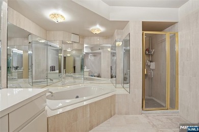 Welcome to Residence 14R at the Atrium, a beautifully maintained