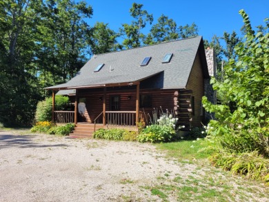 Lake Home For Sale in Millersburg, Michigan