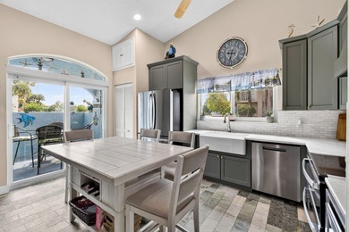 This sought-after, move-in-ready corner unit villa in the - photo 13