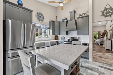 This sought-after, move-in-ready corner unit villa in the - photo 15