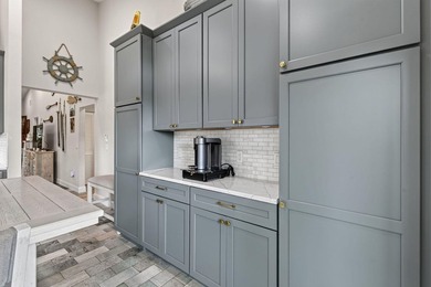 This sought-after, move-in-ready corner unit villa in the - photo 17