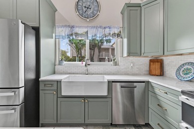 This sought-after, move-in-ready corner unit villa in the - photo 18